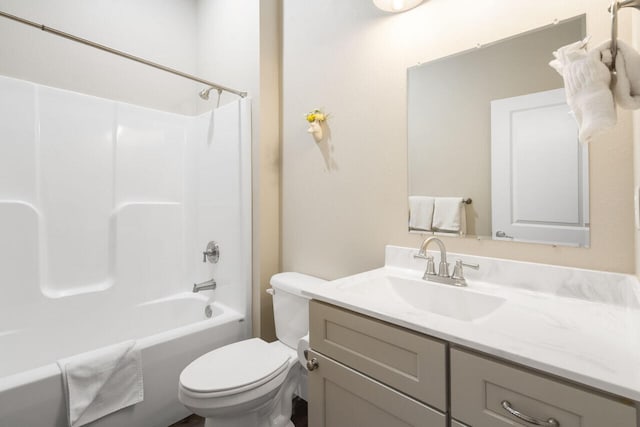 full bathroom featuring vanity, toilet, and shower / washtub combination