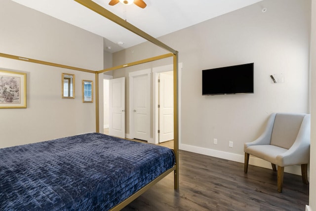 bedroom featuring dark hardwood / wood-style flooring and ceiling fan