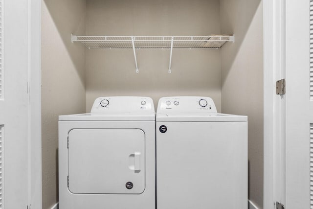 270 Chateau Cove Dr, Branson, MO 65616 - washroom featuring washer and clothes dryer and laundry area