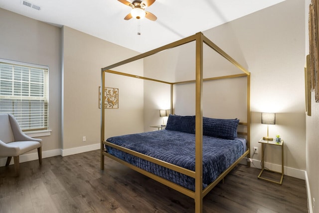 bedroom featuring dark wood-type flooring and ceiling fan