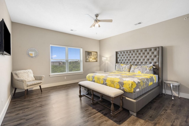 bedroom with ceiling fan and dark hardwood / wood-style floors