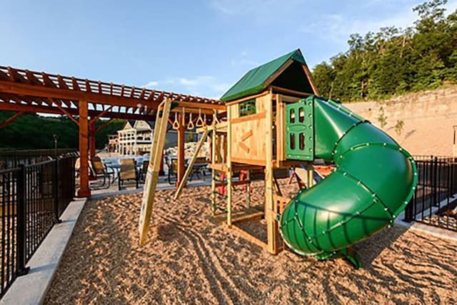270 Chateau Cove Dr, Branson, MO 65616 - community play area featuring a pergola and fence
