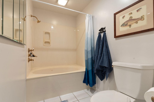 bathroom with tile patterned floors, shower / tub combo, and toilet