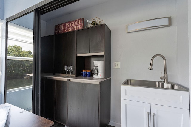 kitchen with white cabinets and sink