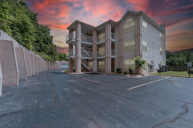 view of outdoor building at dusk