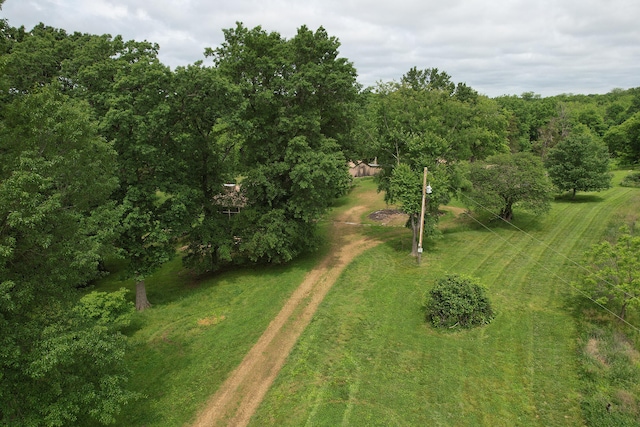 birds eye view of property featuring a rural view