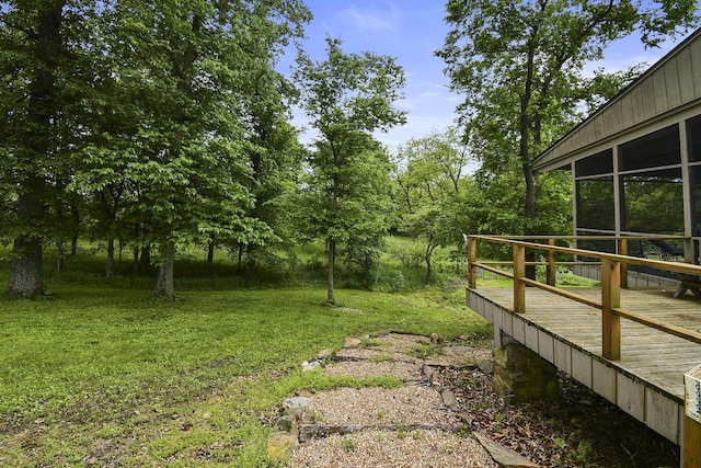 view of yard featuring a deck