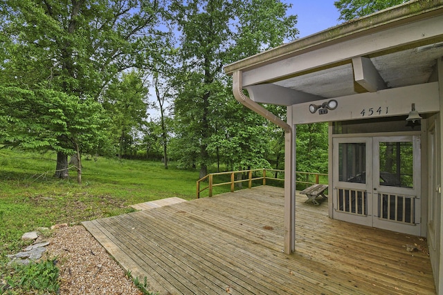 deck featuring a yard