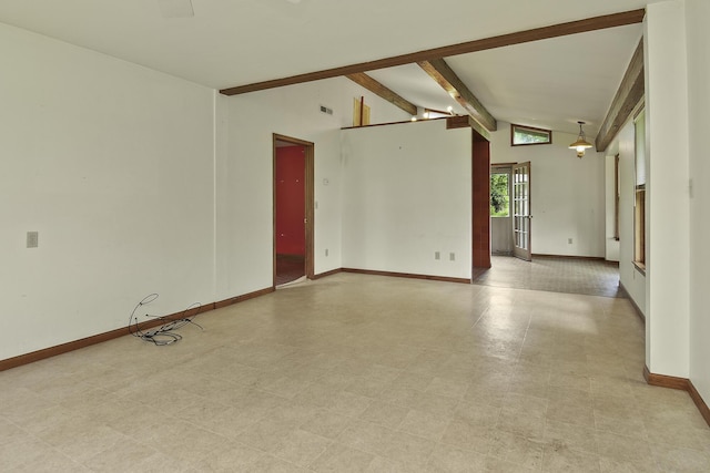 empty room featuring light floors, baseboards, vaulted ceiling with beams, and visible vents
