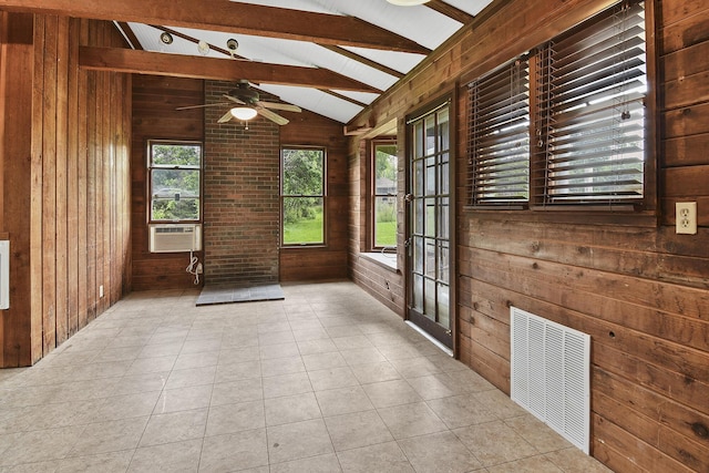 unfurnished sunroom featuring beamed ceiling, french doors, visible vents, and cooling unit