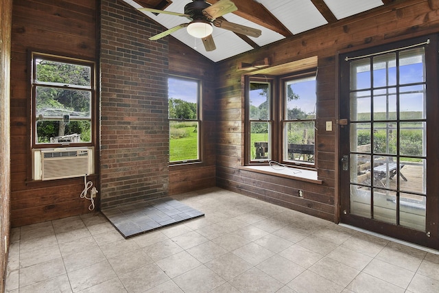 unfurnished sunroom with a healthy amount of sunlight and cooling unit