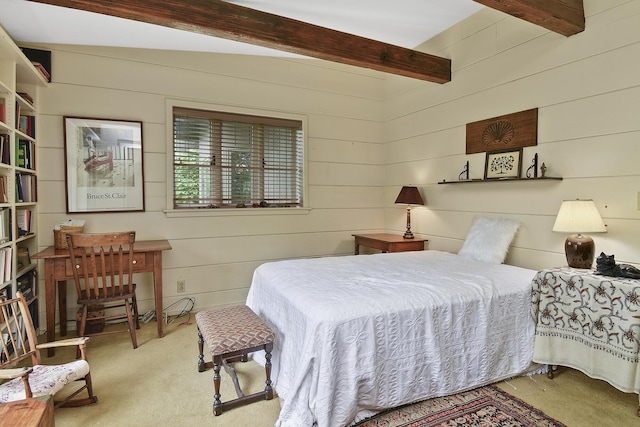carpeted bedroom featuring beamed ceiling and wood walls