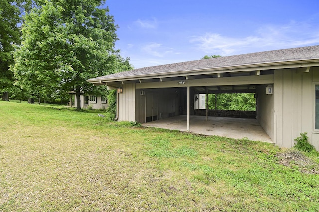 garage featuring a carport