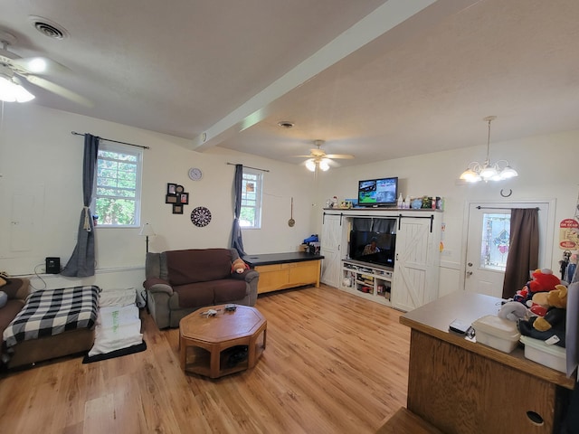 living room with hardwood / wood-style flooring and ceiling fan