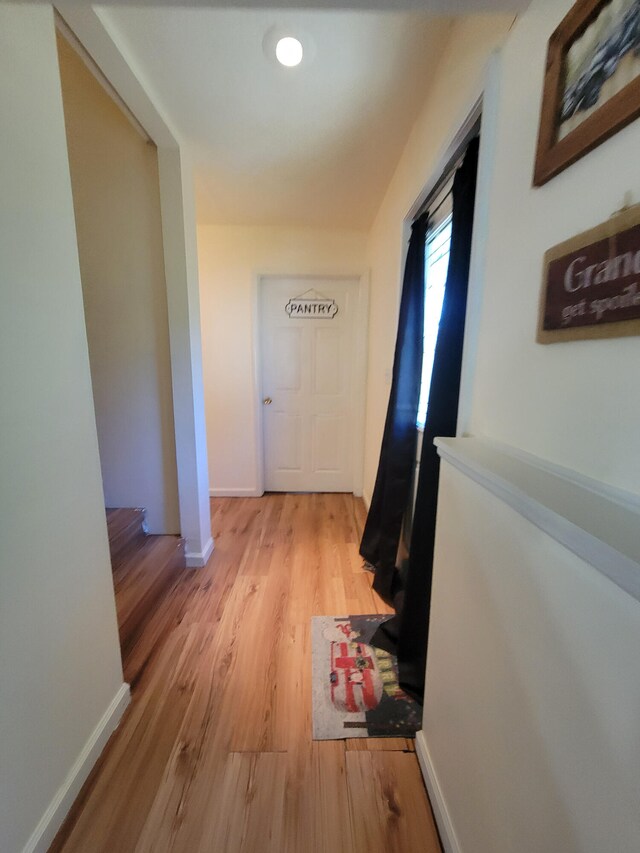 hallway featuring light hardwood / wood-style floors