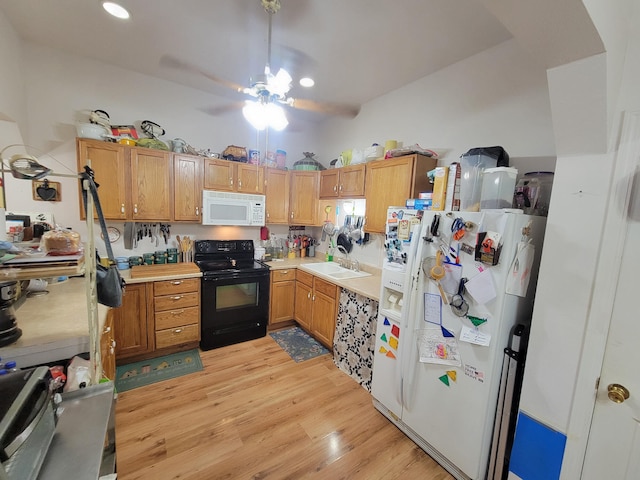 5317 E Ave, Morrisville, MO 65710 - kitchen featuring a ceiling fan, light countertops, white appliances, and light wood-type flooring