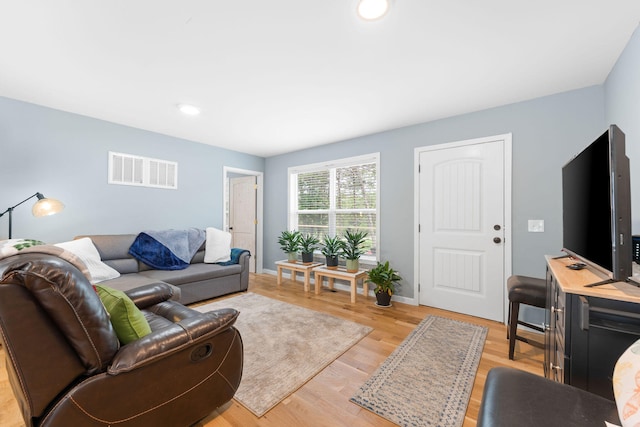 living room featuring light hardwood / wood-style floors