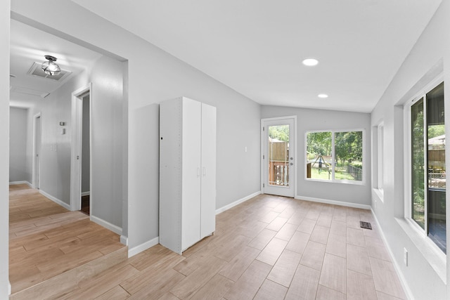 interior space featuring vaulted ceiling