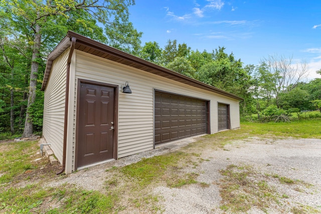 garage with wood walls