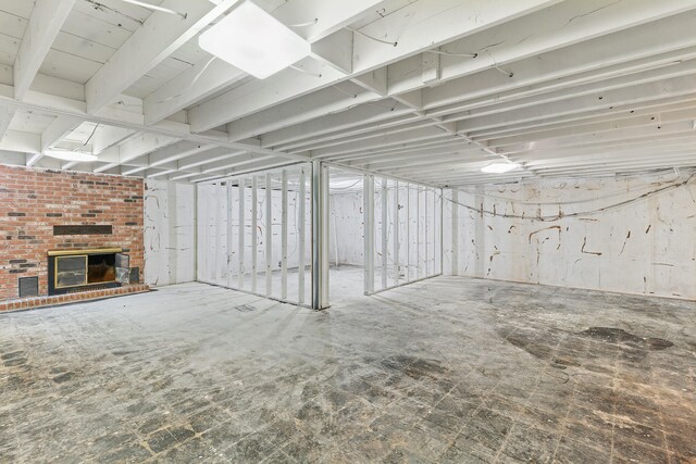 basement with a fireplace