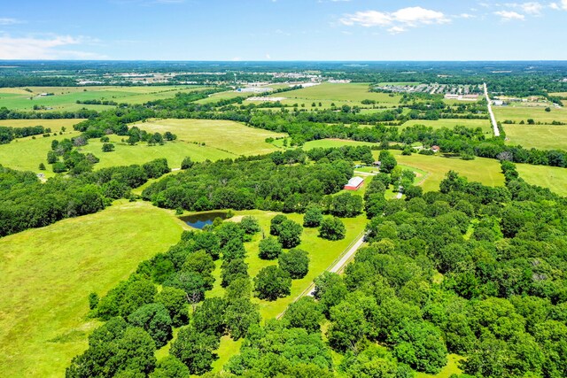 drone / aerial view with a rural view and a water view