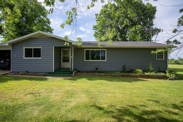 ranch-style home with a front lawn