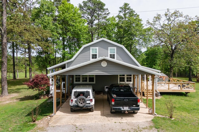 view of front of home featuring a carport and a front lawn