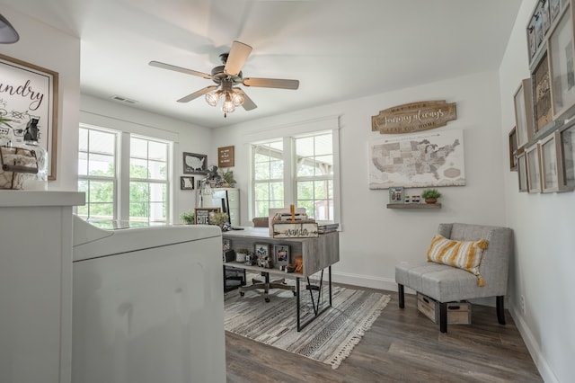 home office featuring ceiling fan and dark hardwood / wood-style flooring