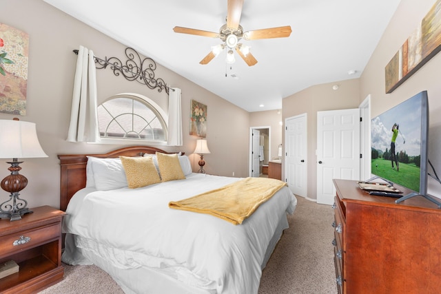 bedroom with ensuite bathroom, carpet floors, a closet, and ceiling fan