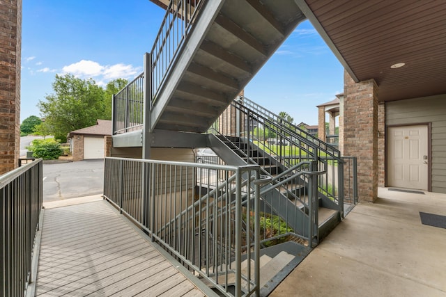balcony featuring stairs