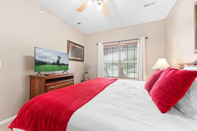 bedroom with ceiling fan, baseboards, and visible vents