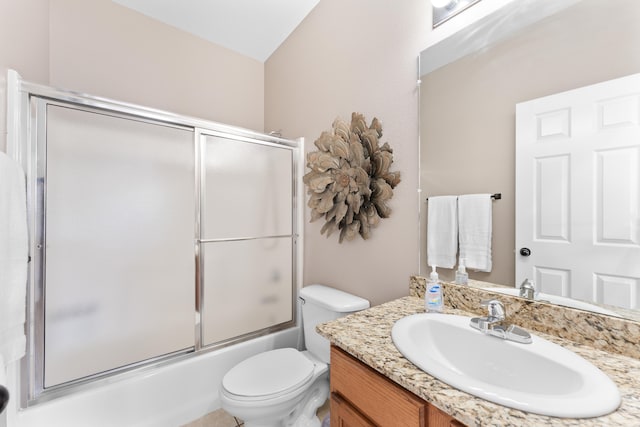 full bathroom with lofted ceiling, enclosed tub / shower combo, vanity, and toilet