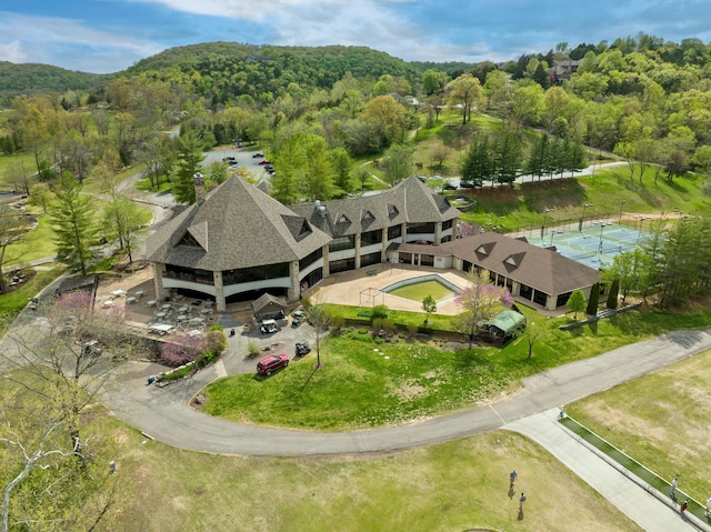 bird's eye view featuring a forest view