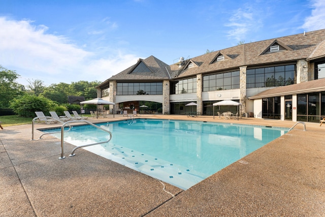 view of pool with a patio area