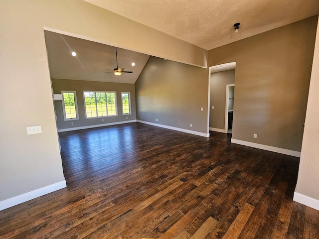 spare room with high vaulted ceiling, ceiling fan, dark hardwood / wood-style floors, and a textured ceiling