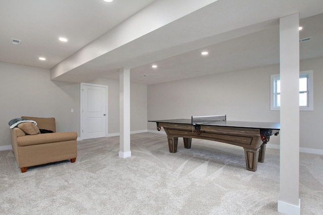 game room featuring light carpet