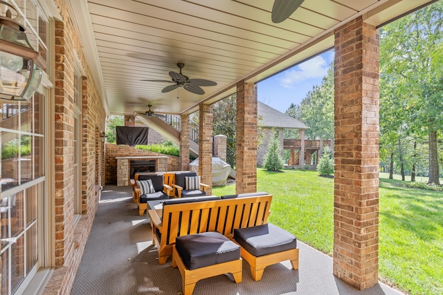 view of patio / terrace featuring an outdoor living space and ceiling fan