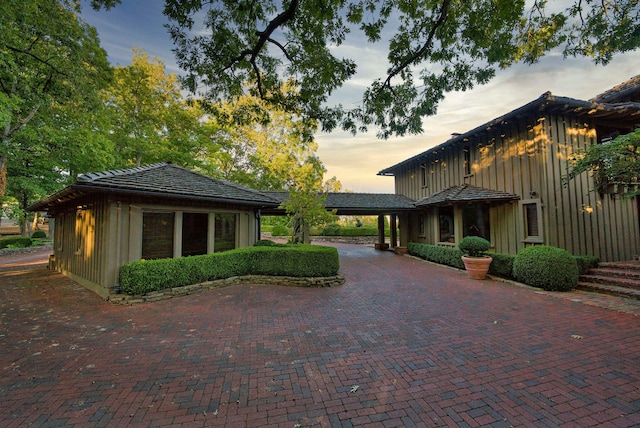 view of property exterior at dusk