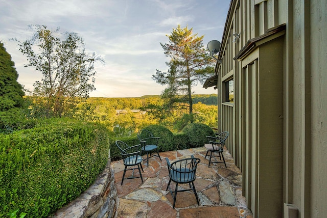 view of patio terrace at dusk