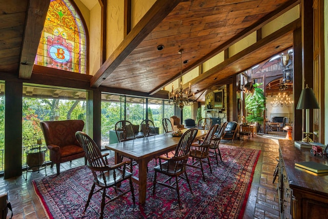 interior space with high vaulted ceiling, wooden ceiling, and an inviting chandelier