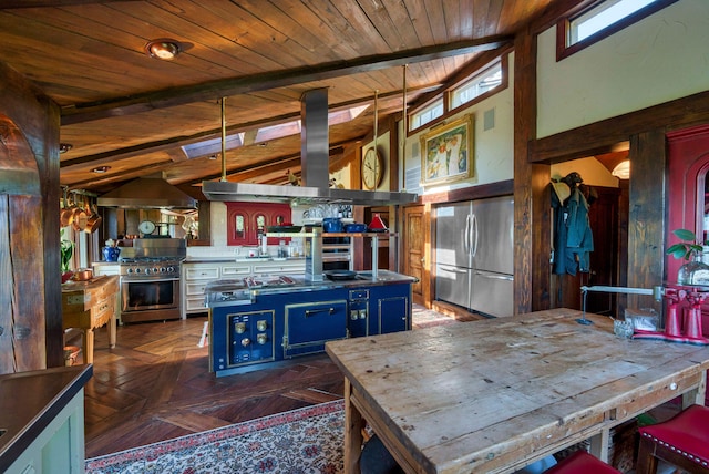 kitchen featuring beamed ceiling, dark parquet floors, exhaust hood, stainless steel appliances, and blue cabinetry