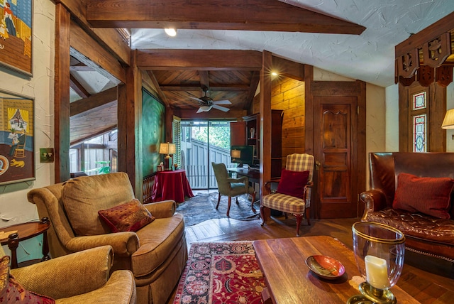 living room featuring wood walls, lofted ceiling with beams, dark hardwood / wood-style flooring, and ceiling fan