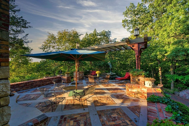 view of patio terrace at dusk