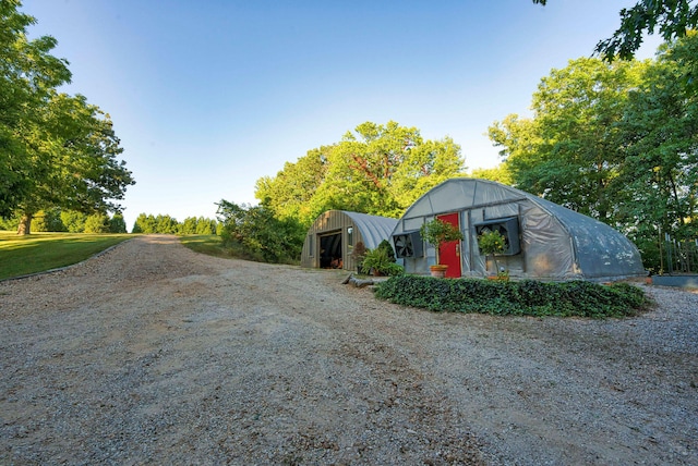 exterior space with an outbuilding