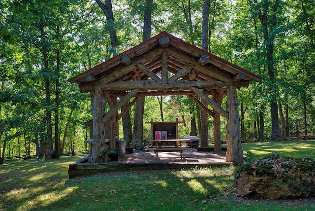 surrounding community with a gazebo and a lawn