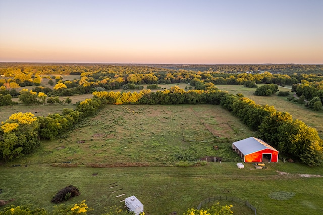 aerial view at dusk with a rural view