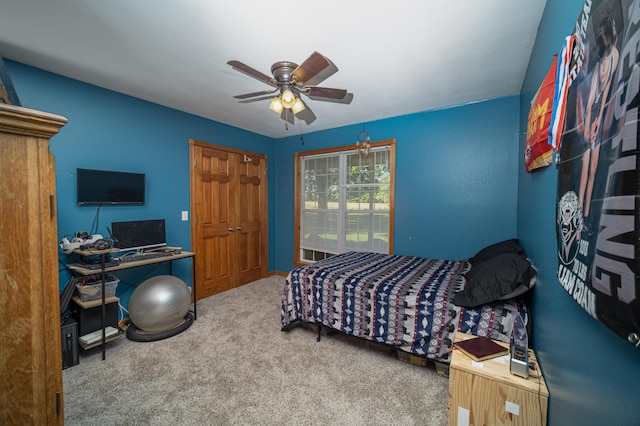 bedroom with ceiling fan and carpet floors