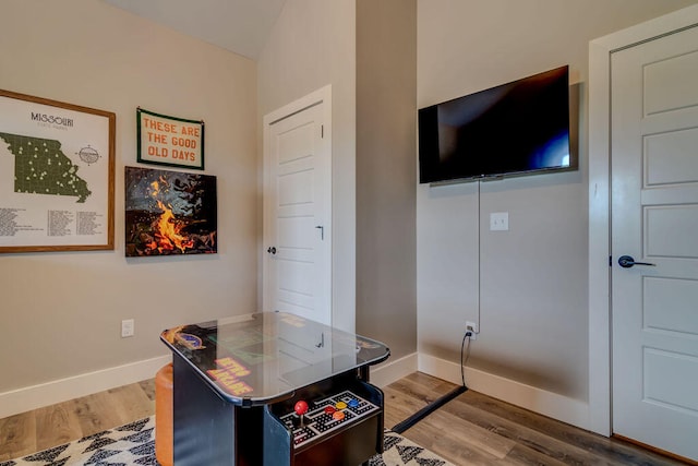 home office with hardwood / wood-style flooring