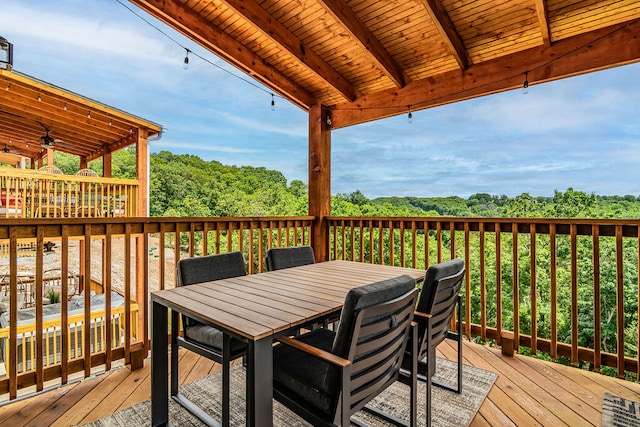 wooden terrace with ceiling fan