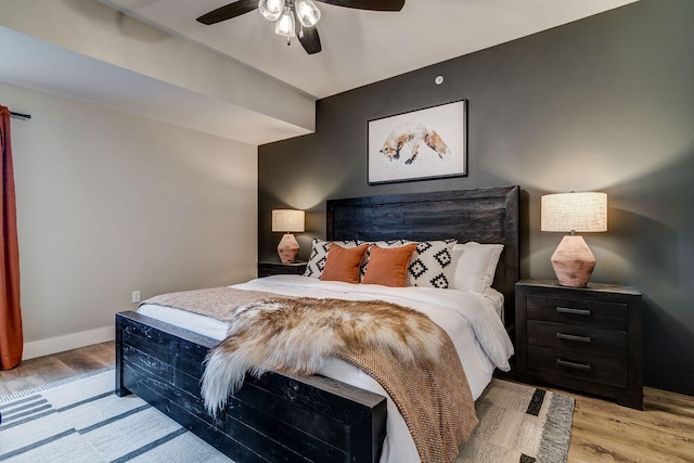 bedroom featuring ceiling fan and light wood-type flooring